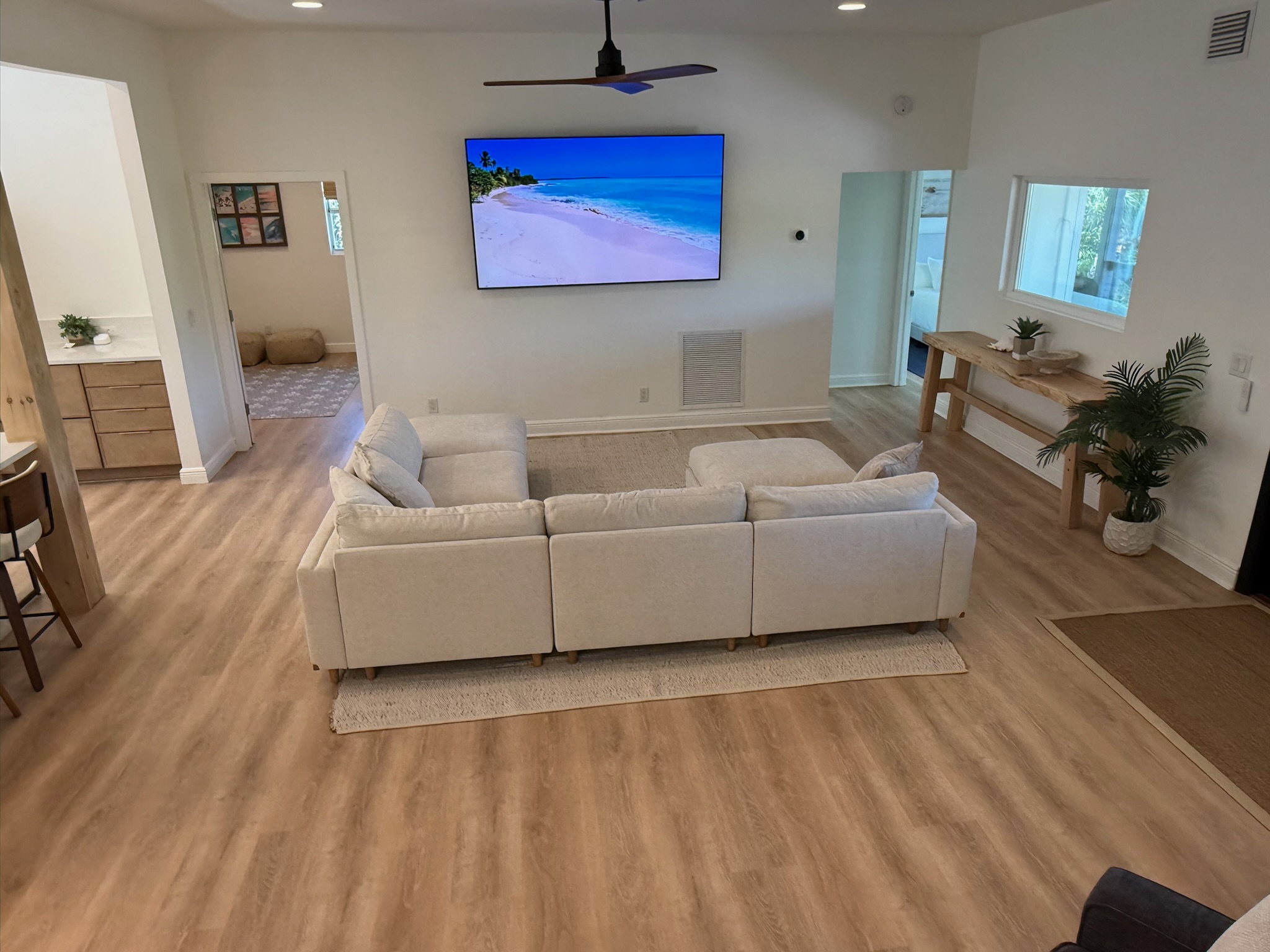 View of living room from stairs. Bunk room to the left and king bedroom 3 to the right