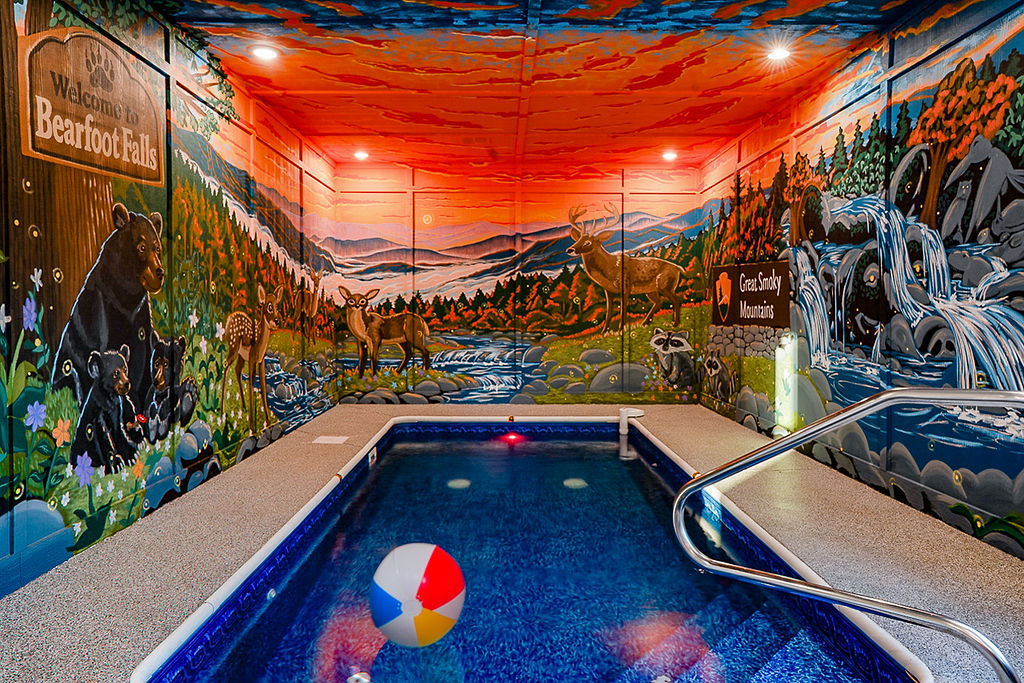 Immersive custom mural surrounds you in the indoor pool room!