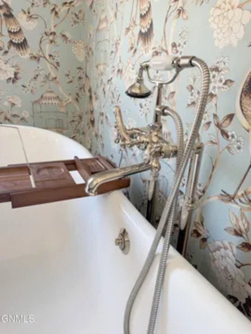 Vintage-style fixtures and the freestanding tub make this feel extra special.
