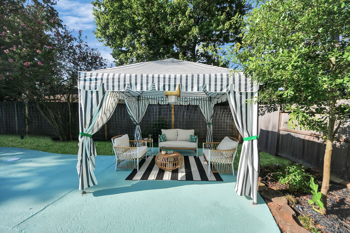 Stylish cabana complete with seating for 4.