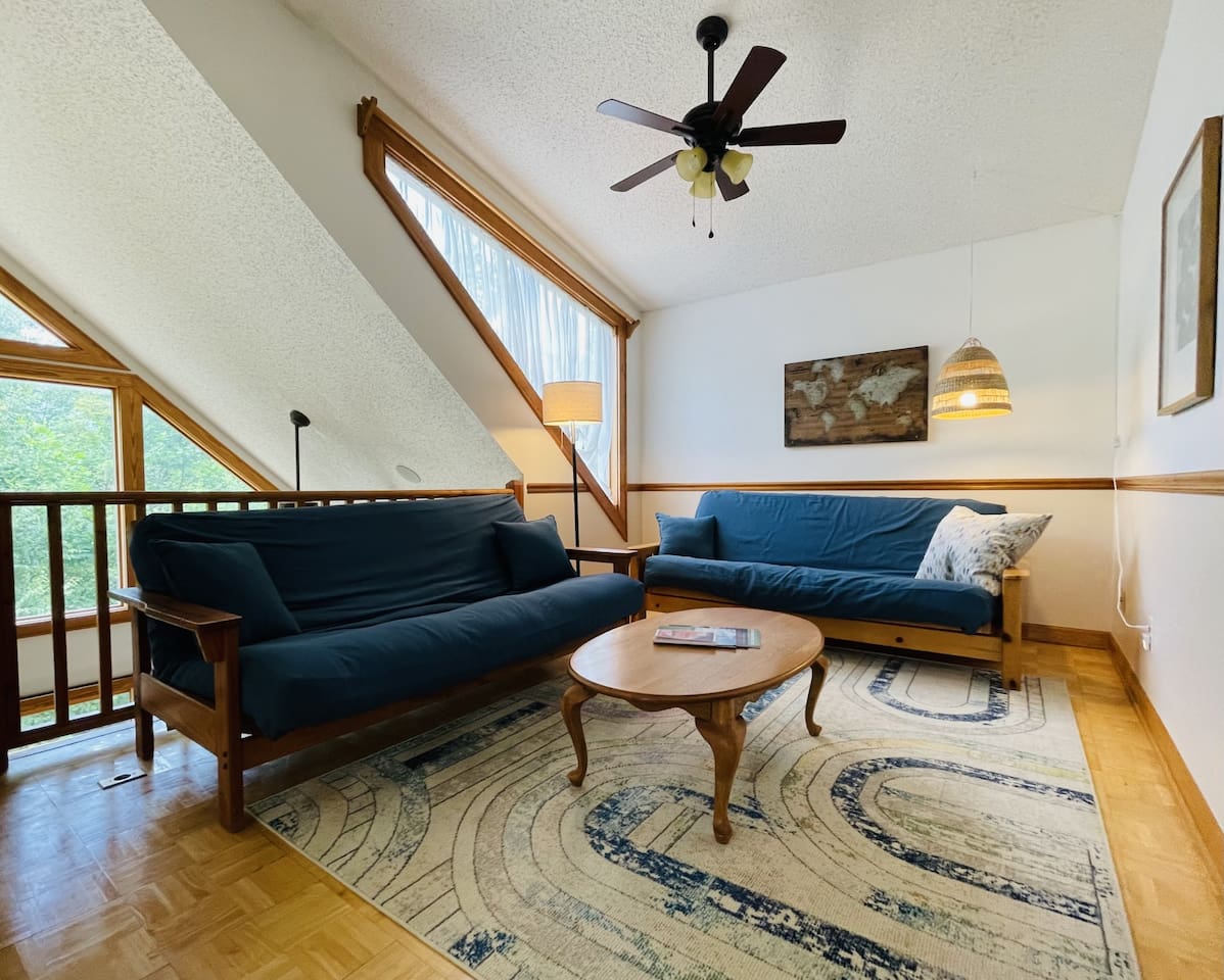 The loft has two futons and the best window view in the house