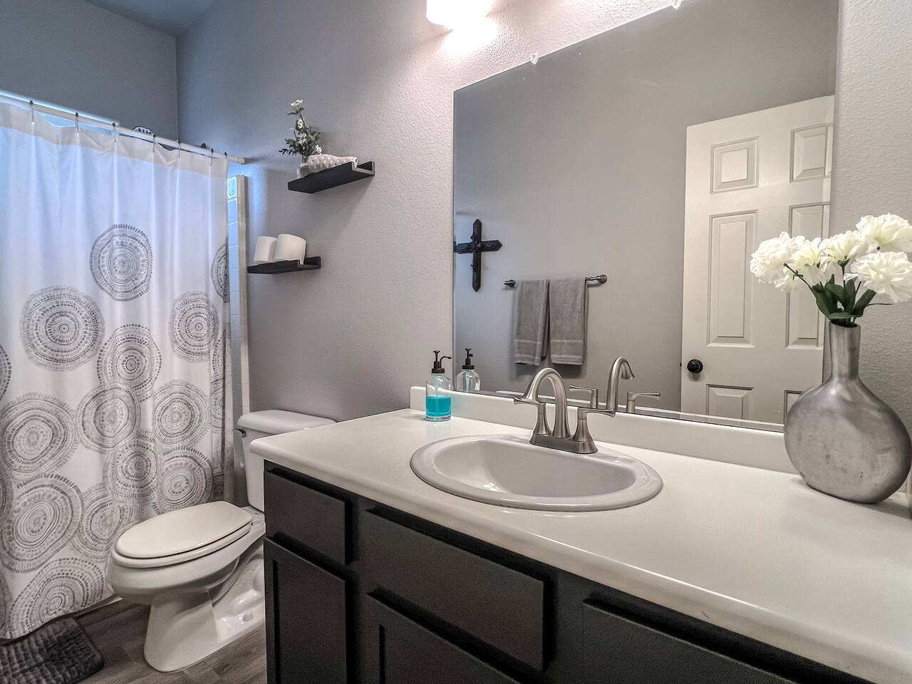 Full bathroom #1 with shower/tub combo and spacious vanity