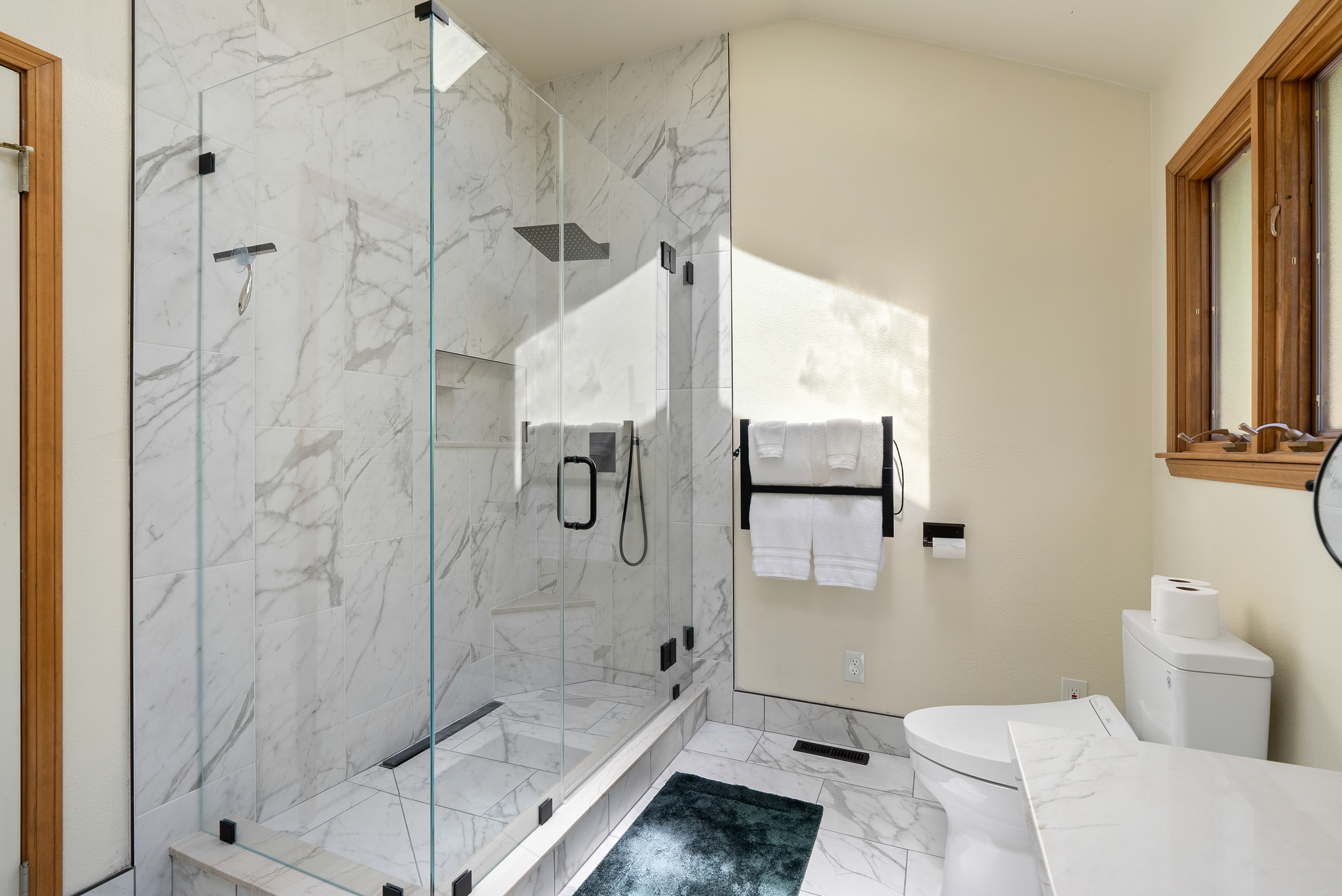 Bright ensuite bath for a spa-like refresh.