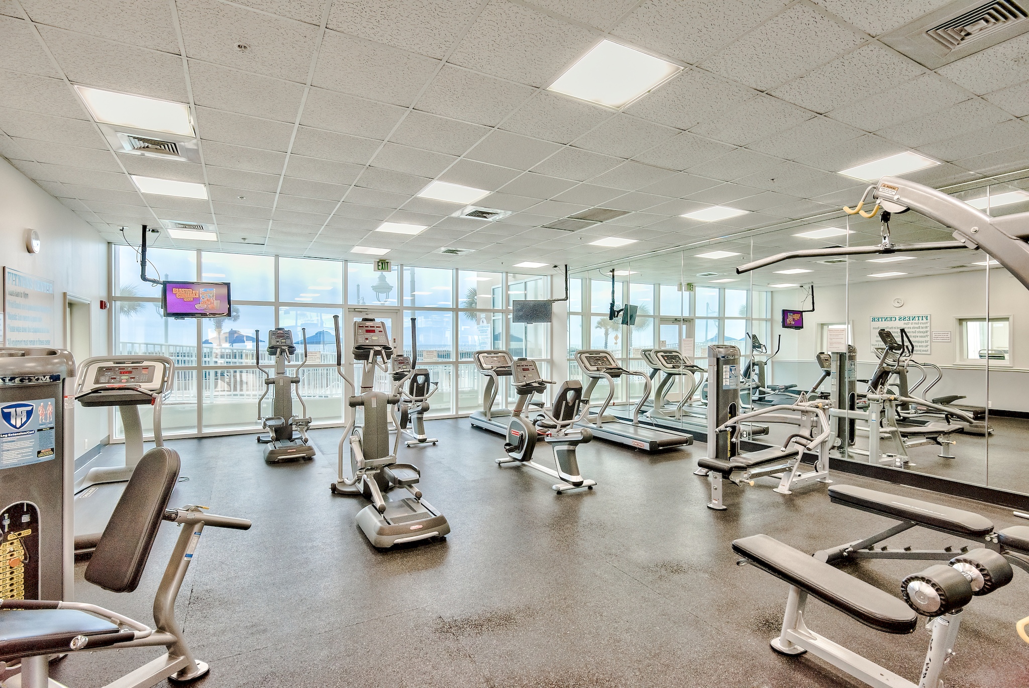 Large, well appointed fitness center (treadmills, stationary bikes, ellipticals, weight machines, and free weights) at Majestic Sun with Pool and Gulf view