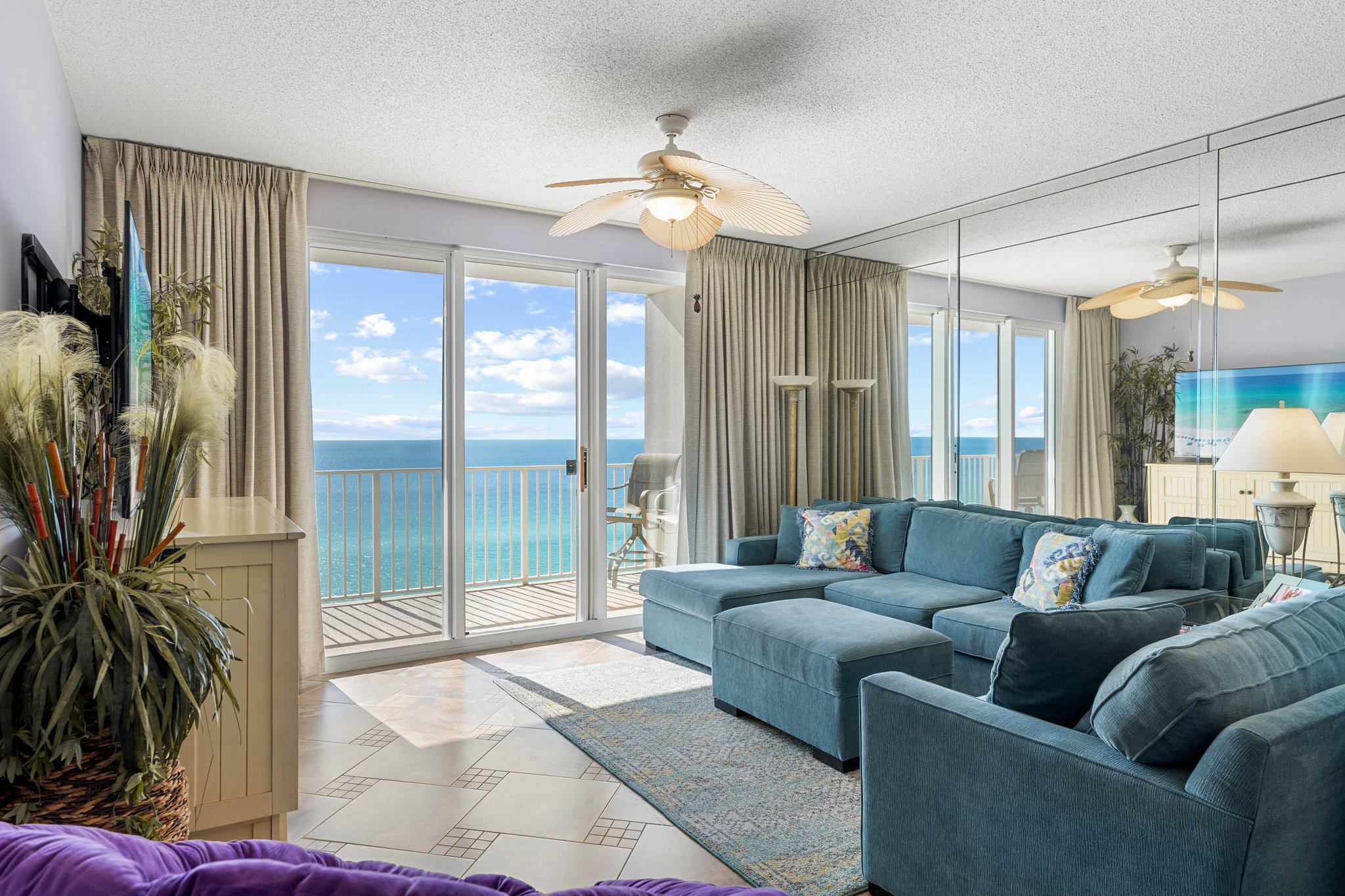 Sun-filled living room w/ plush sofas & space to unwind after beach days.
