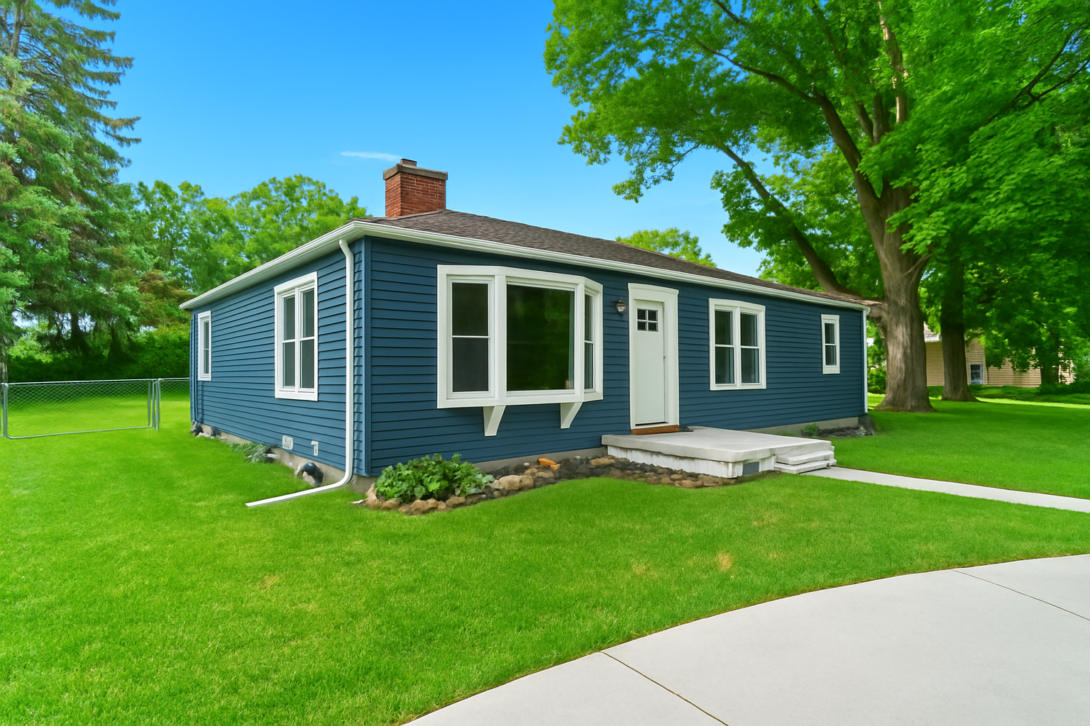 Charming, newly renovated ranch on a spacious lot—just a short stroll from the lake with private entry and fenced yard.