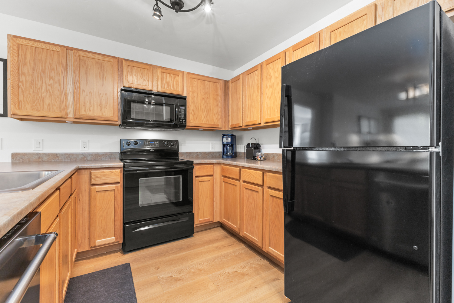 Kitchen – Oven | 4 burner electric stove | Microwave | Refridgerator