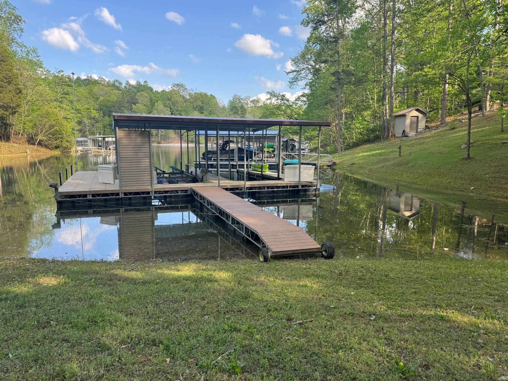 Full Pool with dock pulled up to land