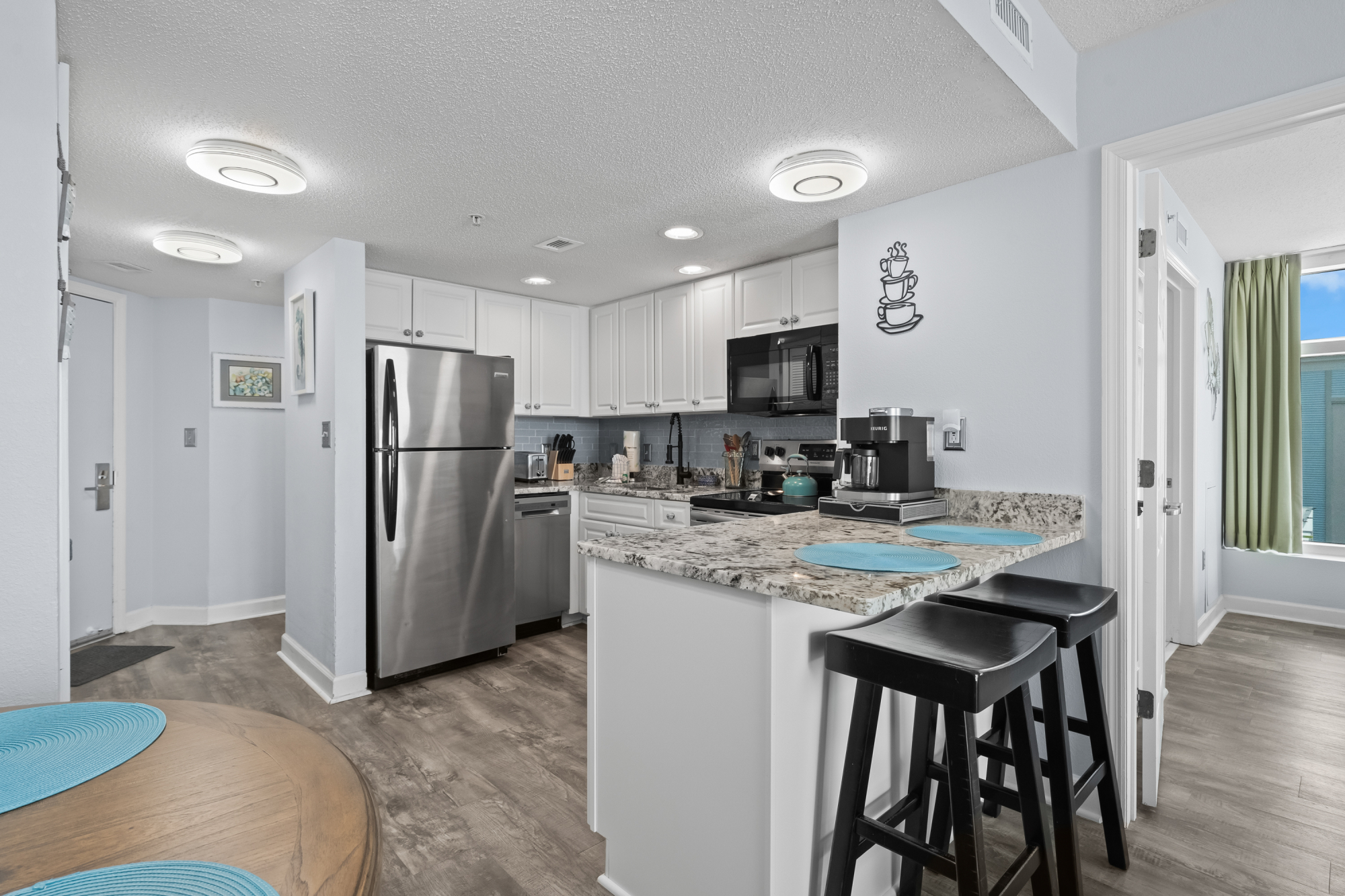 Overall Kitchen Area with Updated, Stainless Steel Appliances