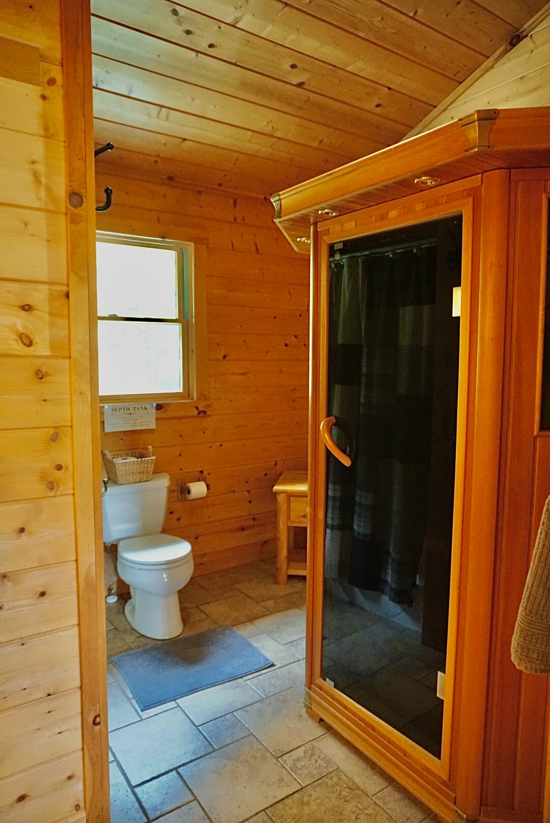 Relax and recharge. This bathroom offers a private sauna for a truly luxurious experience.