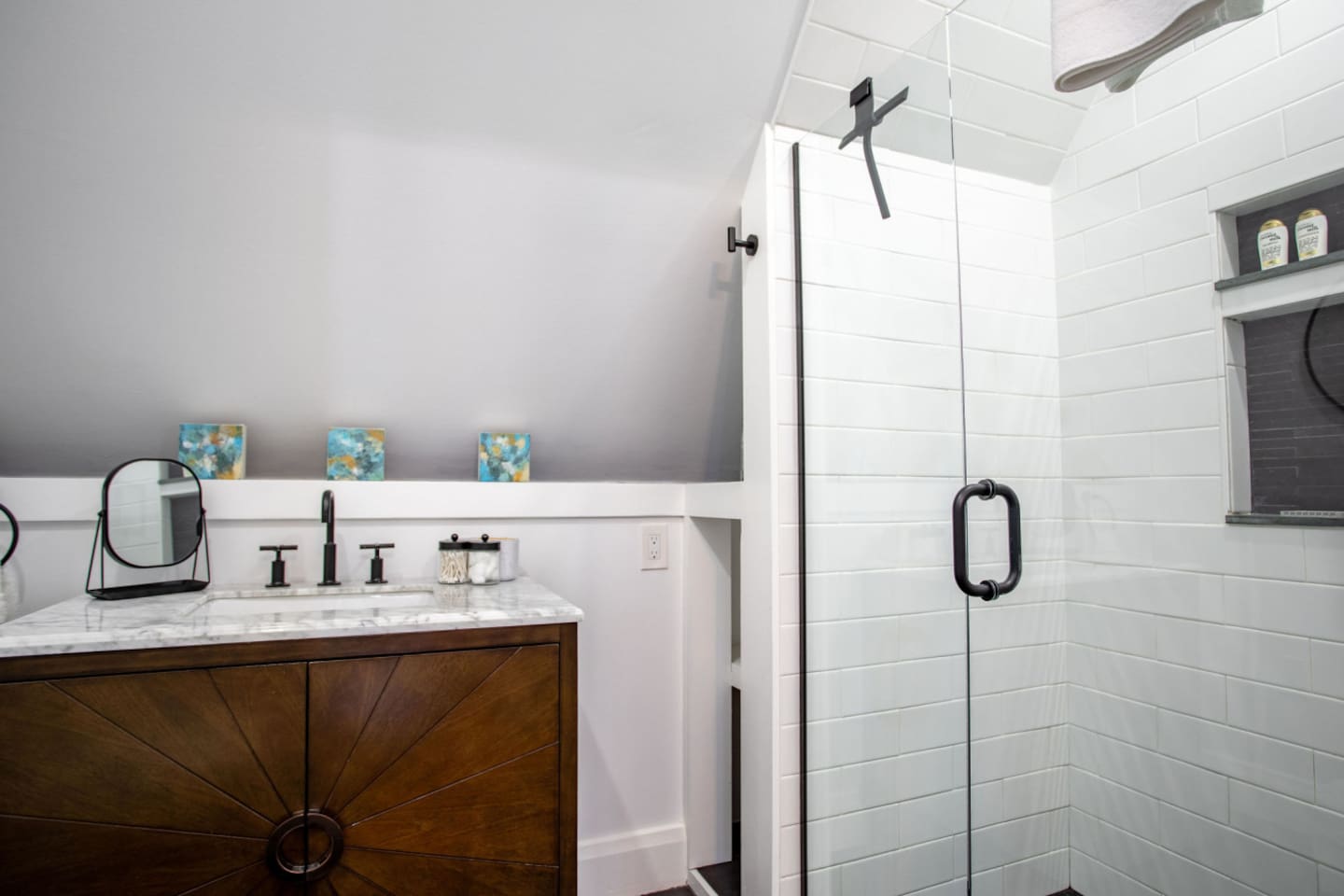 Bathroom sink, and shower.