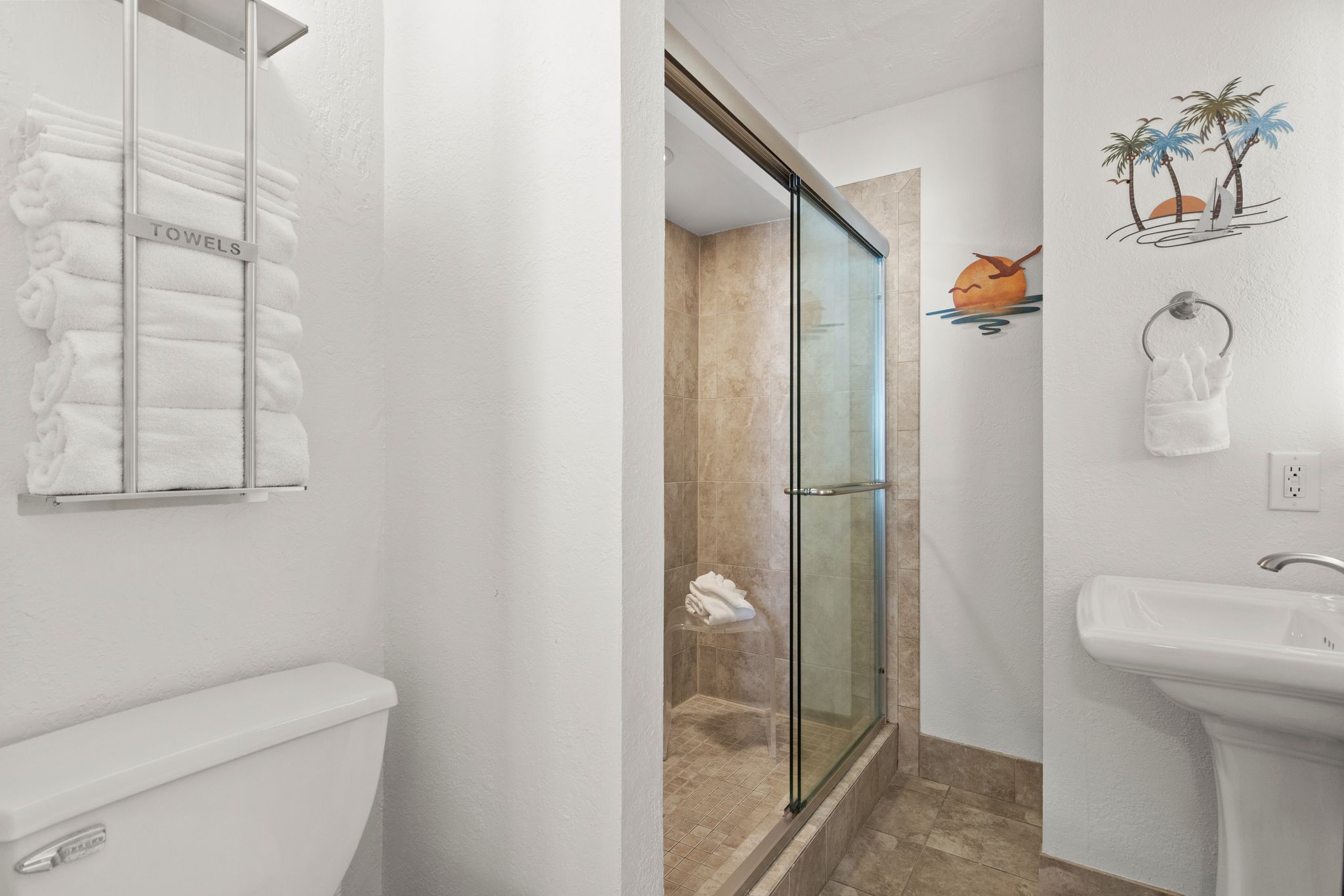 Primary suite includes a 55” Roku Smart TV—perfect for movie nights, streaming your favorites, or winding down after a day at the beach.