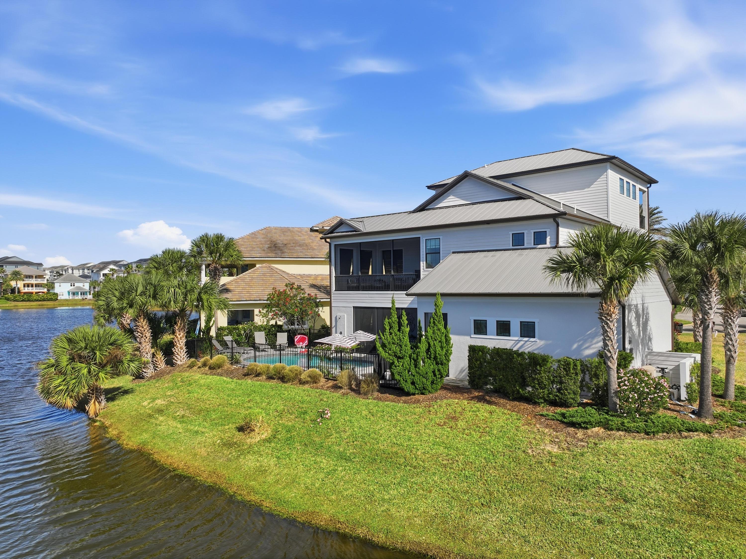 Lakefront serenity, beach days just minutes away 🌴🌊
This stunning home sits on a prime water lot with wide-open views, a private pool oasis, and the perfect Cinnamon Beach setting for the ultimate coastal getaway.