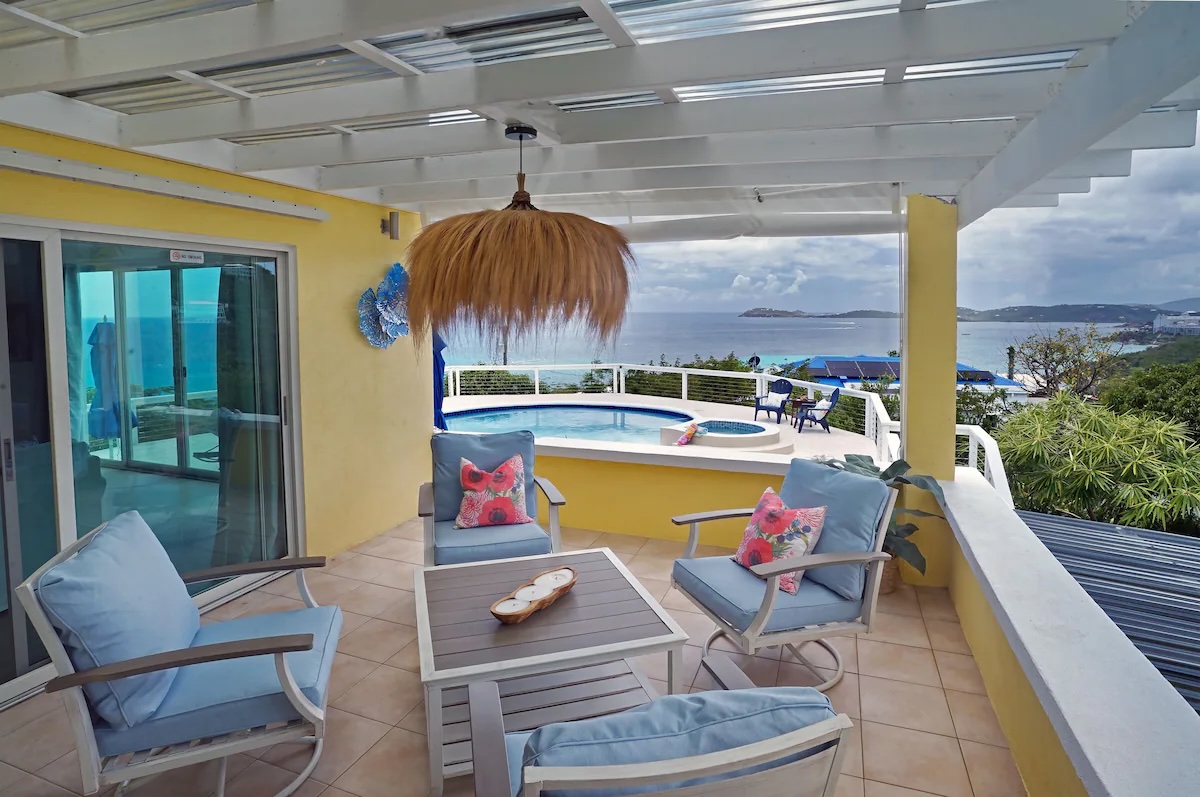 This patio is located between Guest room 1 and the living room.