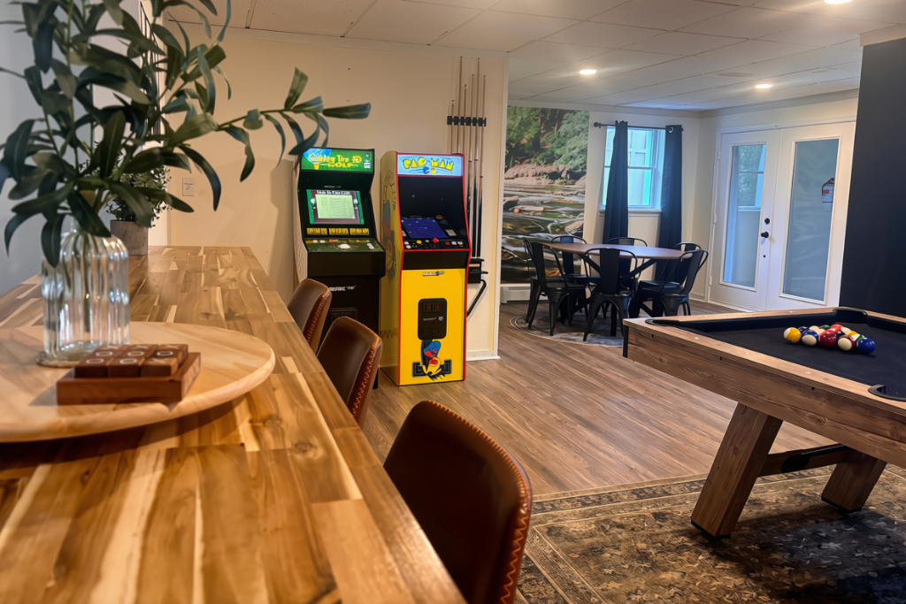 Dinner, a game of eight-ball, and a Pac-Man high score without leaving the room. Patio doors lead straight out back.