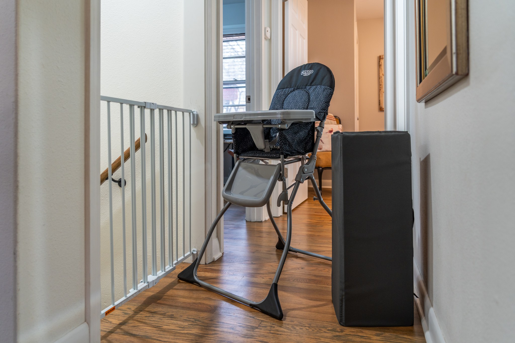 Bring the baby without hauling the gear — a high chair's already here, plus a gate for the stairs.