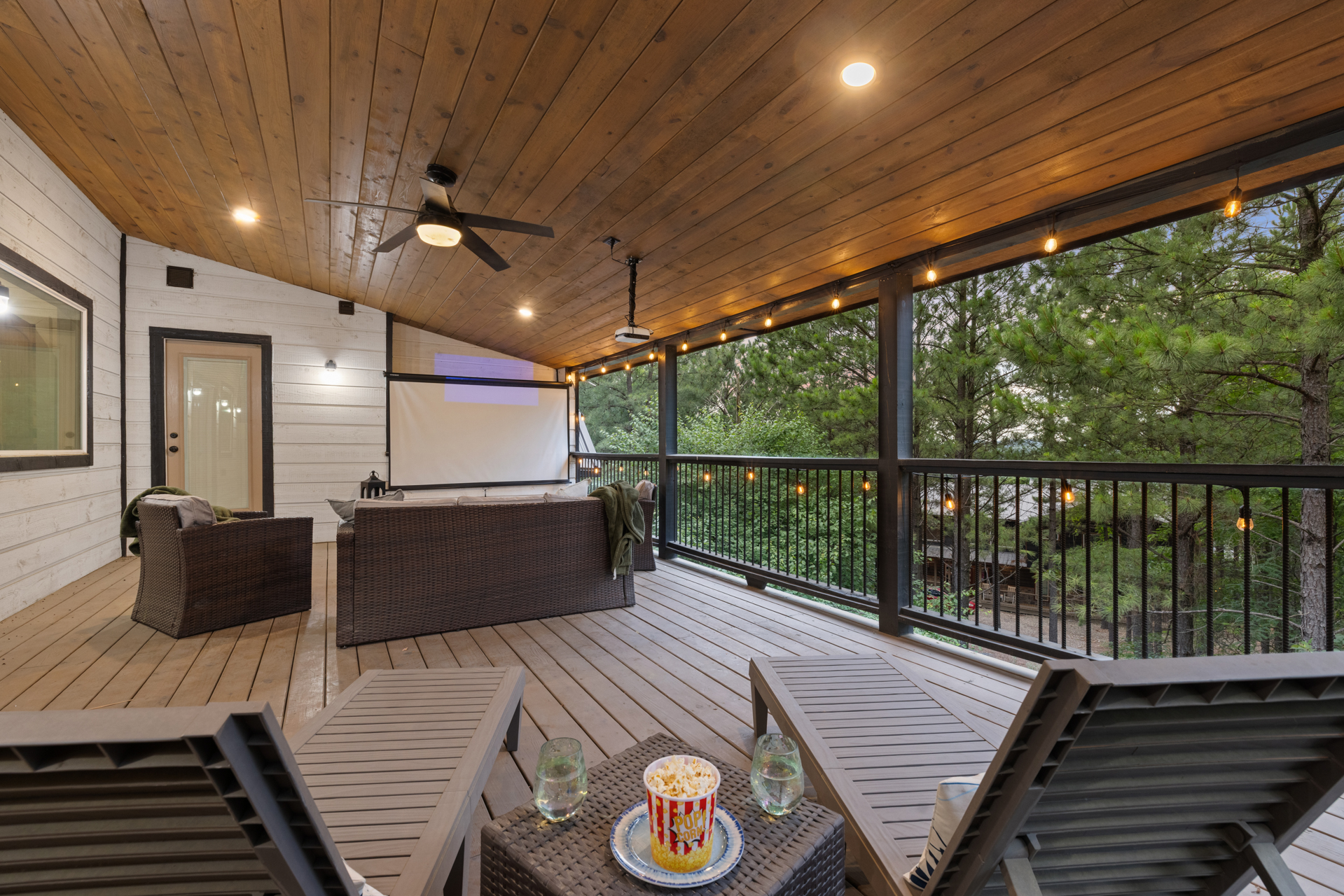 Upstairs covered deck access straight from the game room.
Morning coffee, late night laughs, and fresh air drifting through the trees. This is the kind of hangout spot that quietly becomes everyone’s favorite.