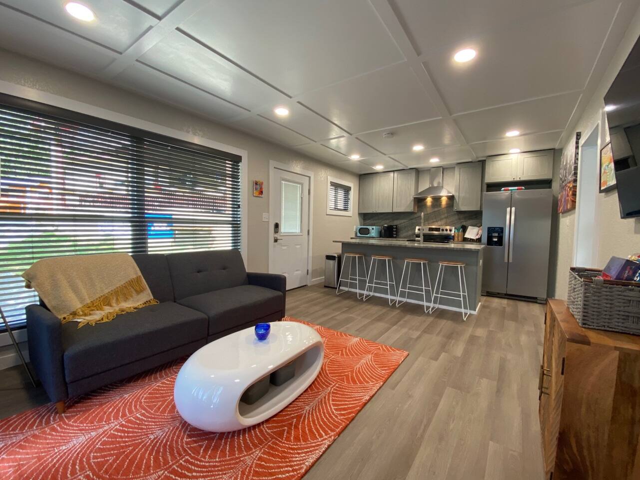 Enjoy Lakefront Views from the Open Living and Kitchen Areas.