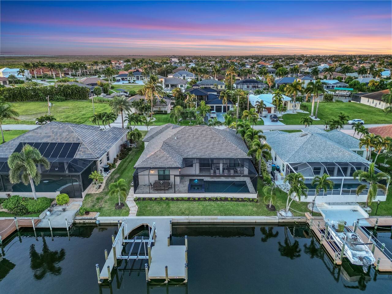 Stunning aerial view showcasing the villa's private dock and serene waterfront!