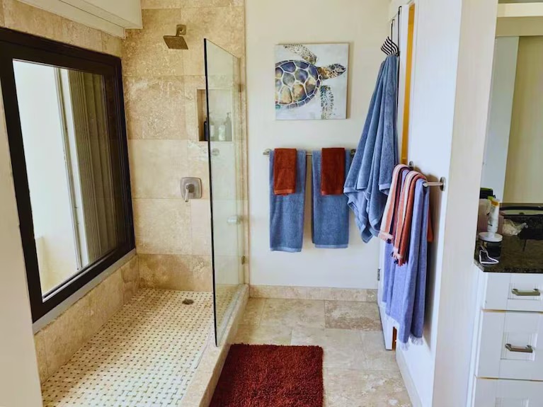 The ensuite bathroom to the primary bedroom