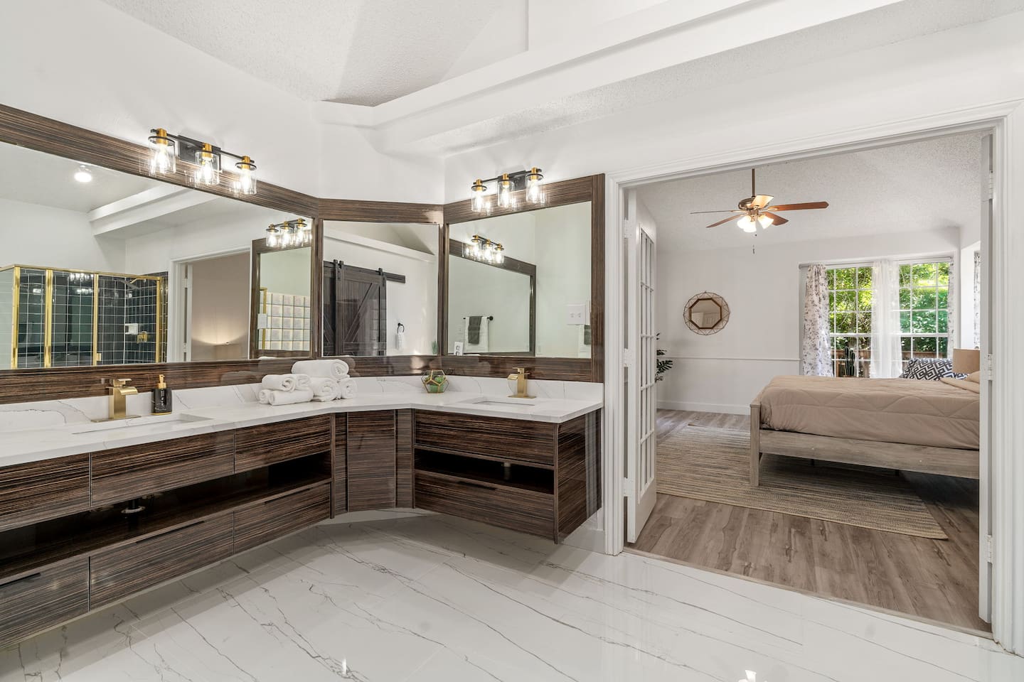 Oversized bathroom with modern amenities and luxe Ginger Lily Farms bath products.