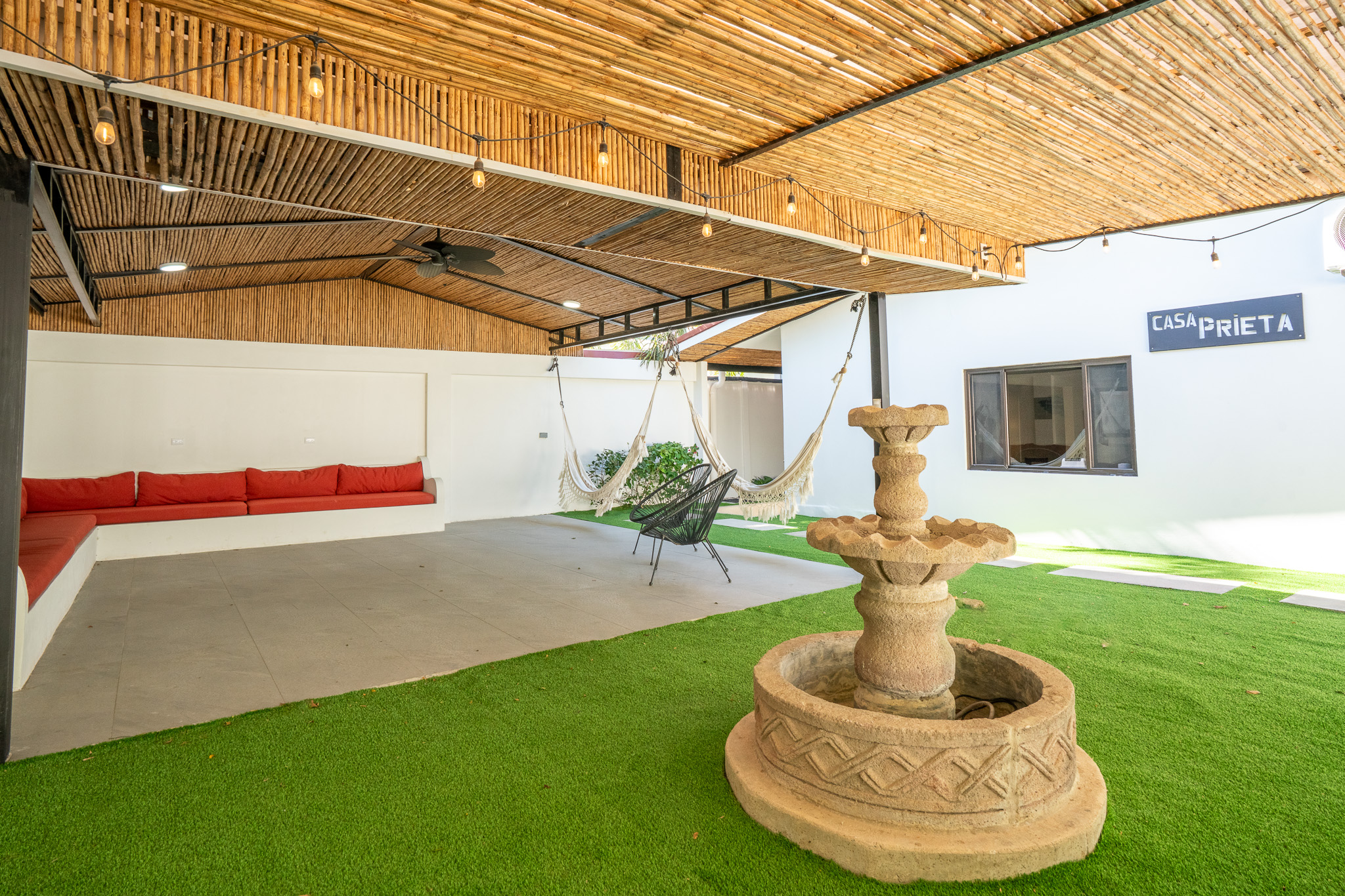 Our water fountain adds a relaxing tropical feel and another place to gather with friends and family.