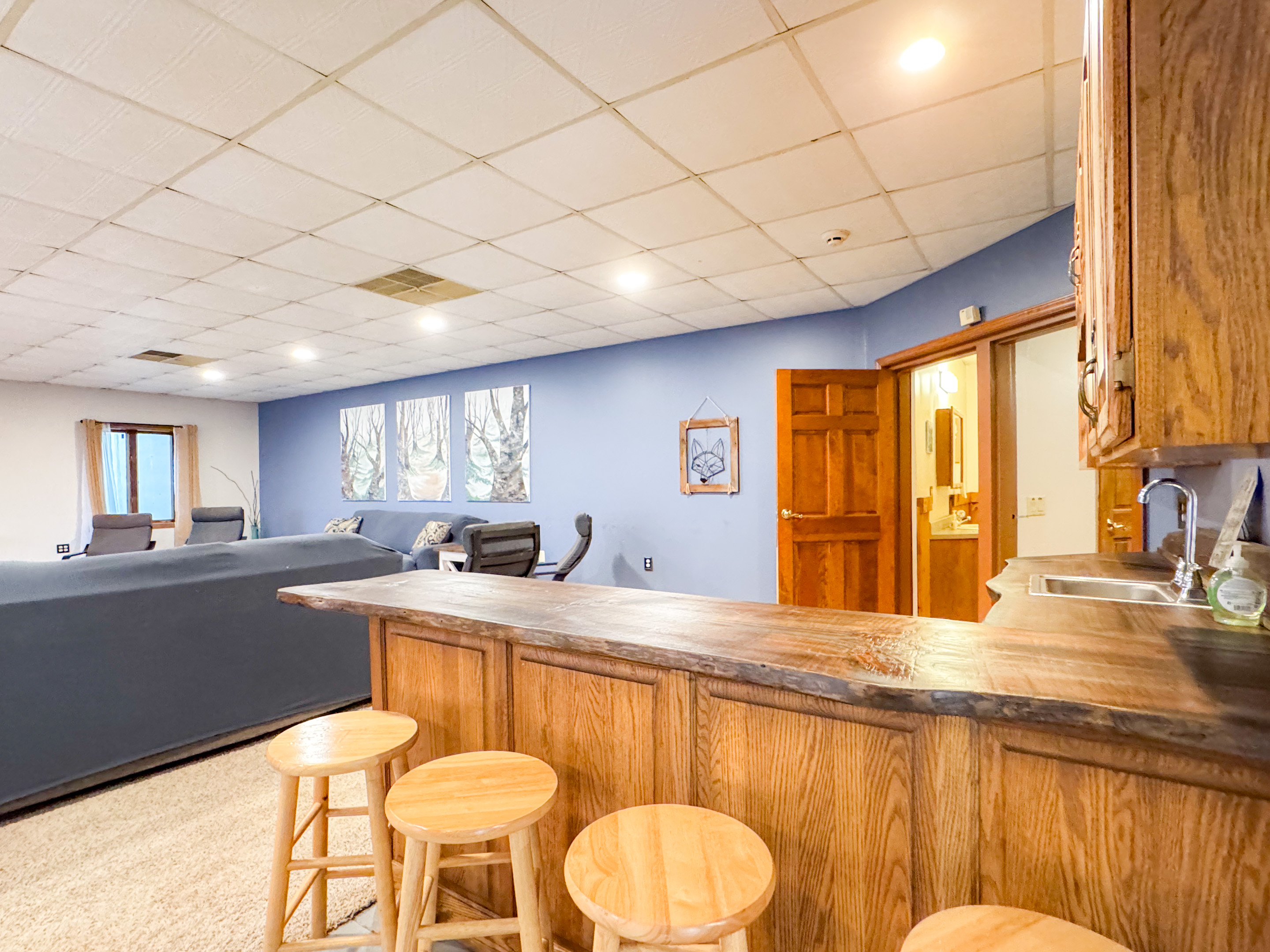 bar top between the downstairs kitchen and living room