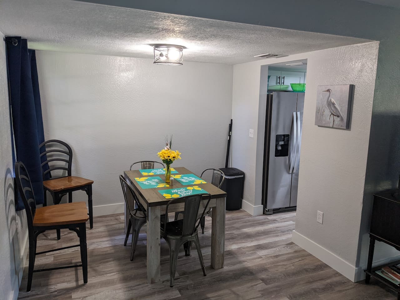 4-setting dining room table with extra chairs