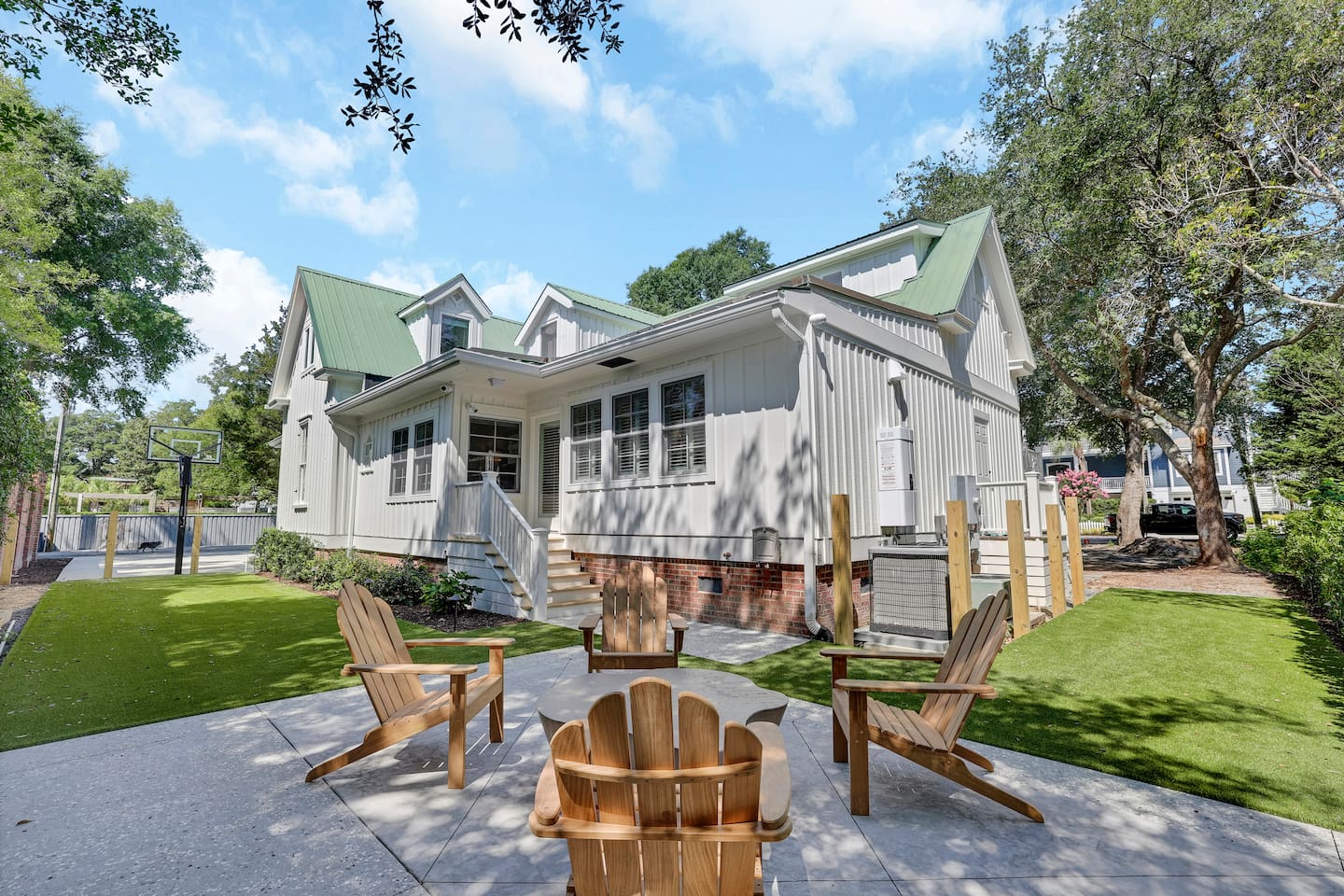 Outdoor patio space along the side of the home. Easily accessed through kitchen.