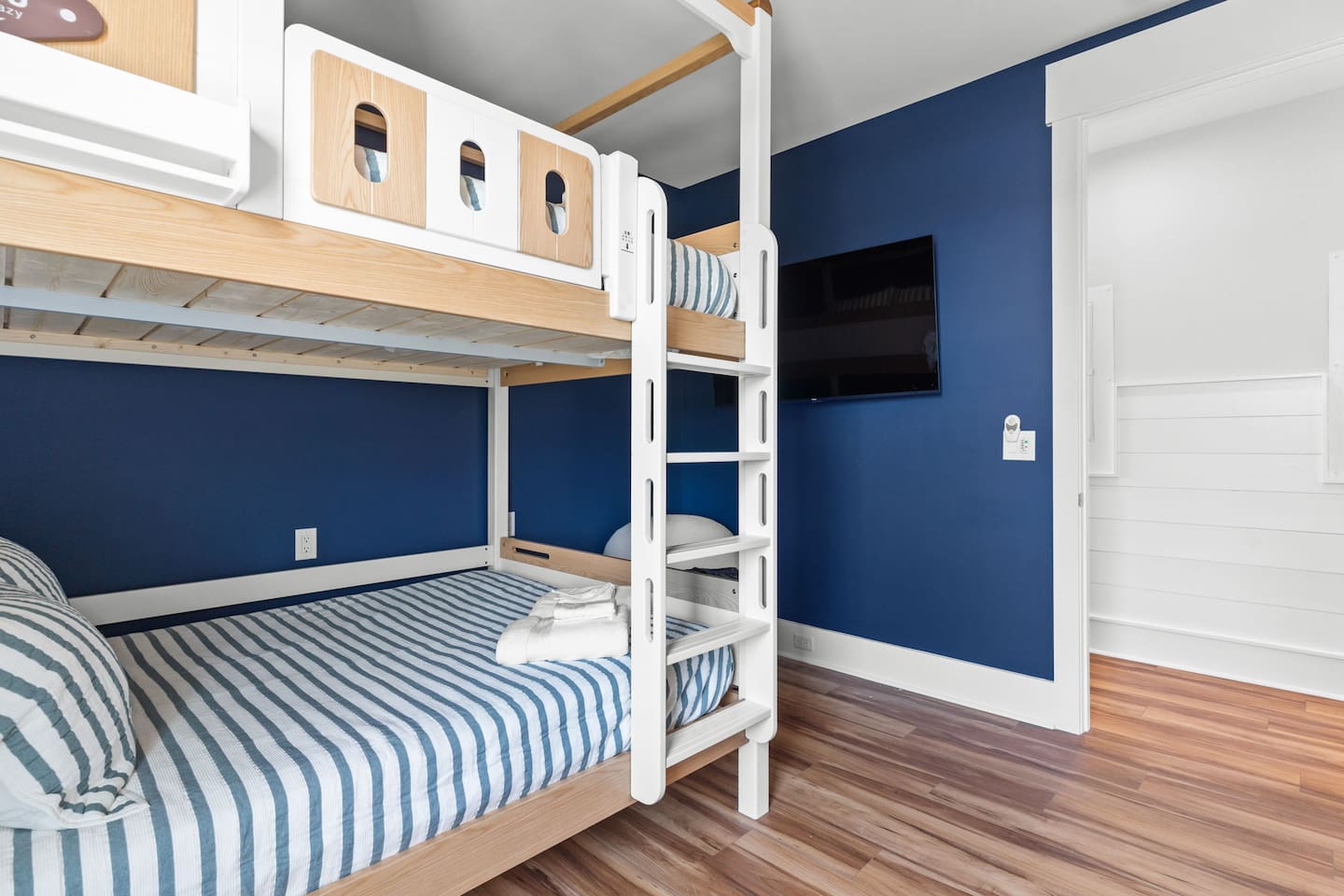 Designed with families in mind, the bunk room gives younger guests their own special space to relax and recharge. Settle in for movie nights on the 55-inch smart TV after days spent at the beach, pool, or volleyball court.