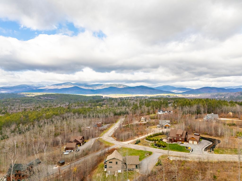 See the full property and surroundings from above.