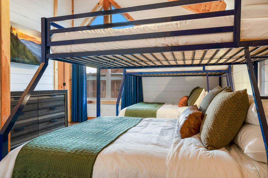 Double bunk beds in the fun bunk room upstairs off the game room.