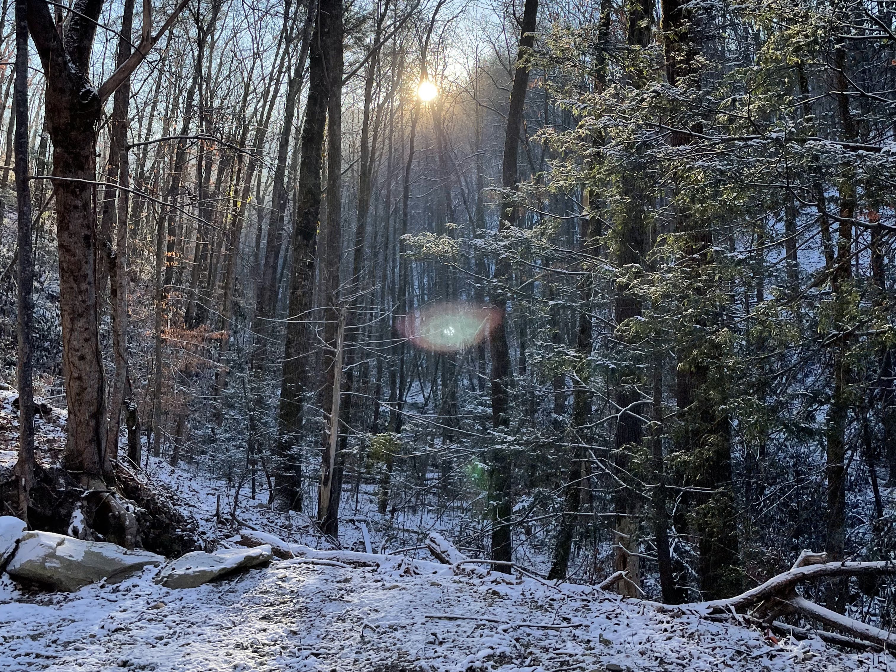 A cold winter morning and the sun rising over the snow covered creek below.  You're wrapped in a cozy blanket, enjoying your steaming hot coffee.