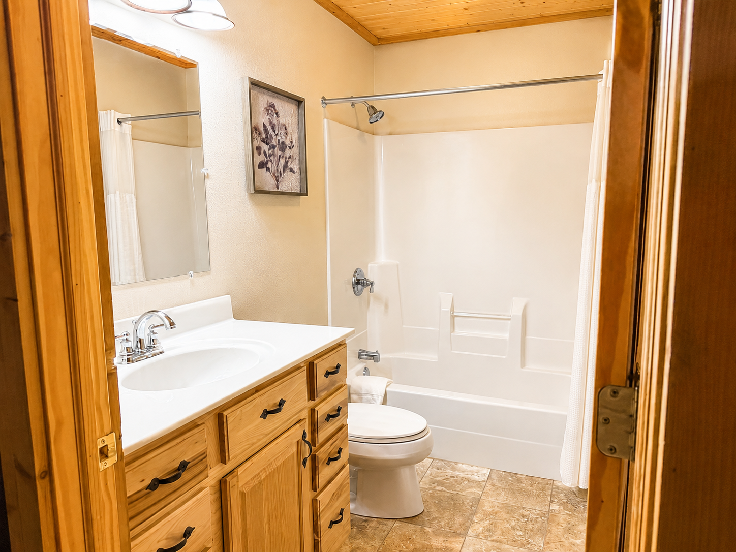 Basement full bathroom with a tub and shower makes mornings and evenings easier when the House is full.
