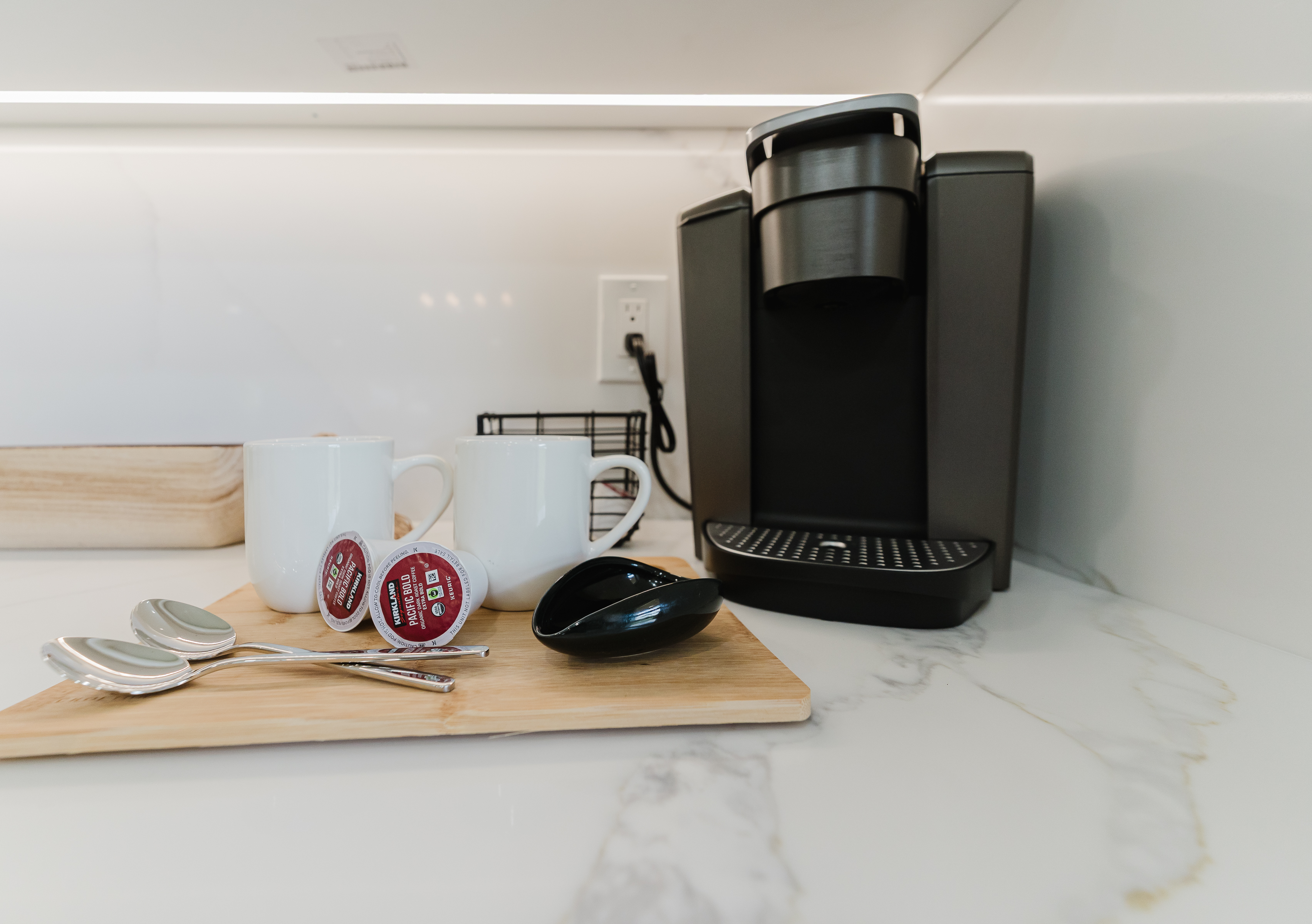 Fully equipped kitchen with everything needed for home-cooked meals. Modern appliances and ample counter space for easy meal prep. Bright and functional kitchen perfect for extended stays.