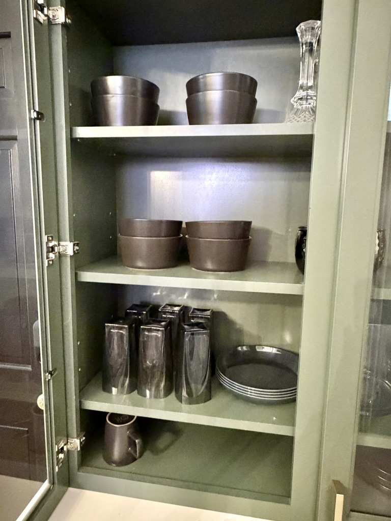 Fully equipped kitchen with pots and pans, utensils, dishes, and stemwaer