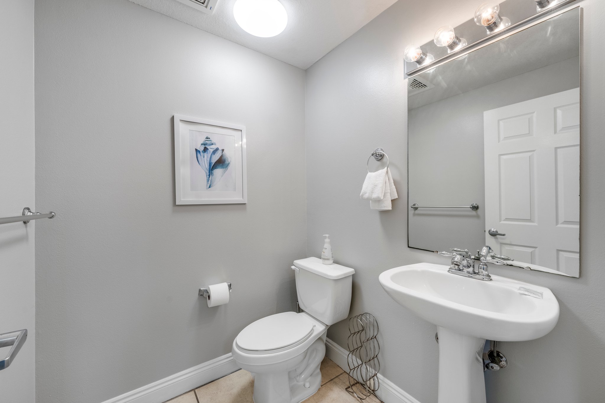 Half bath located off hall way