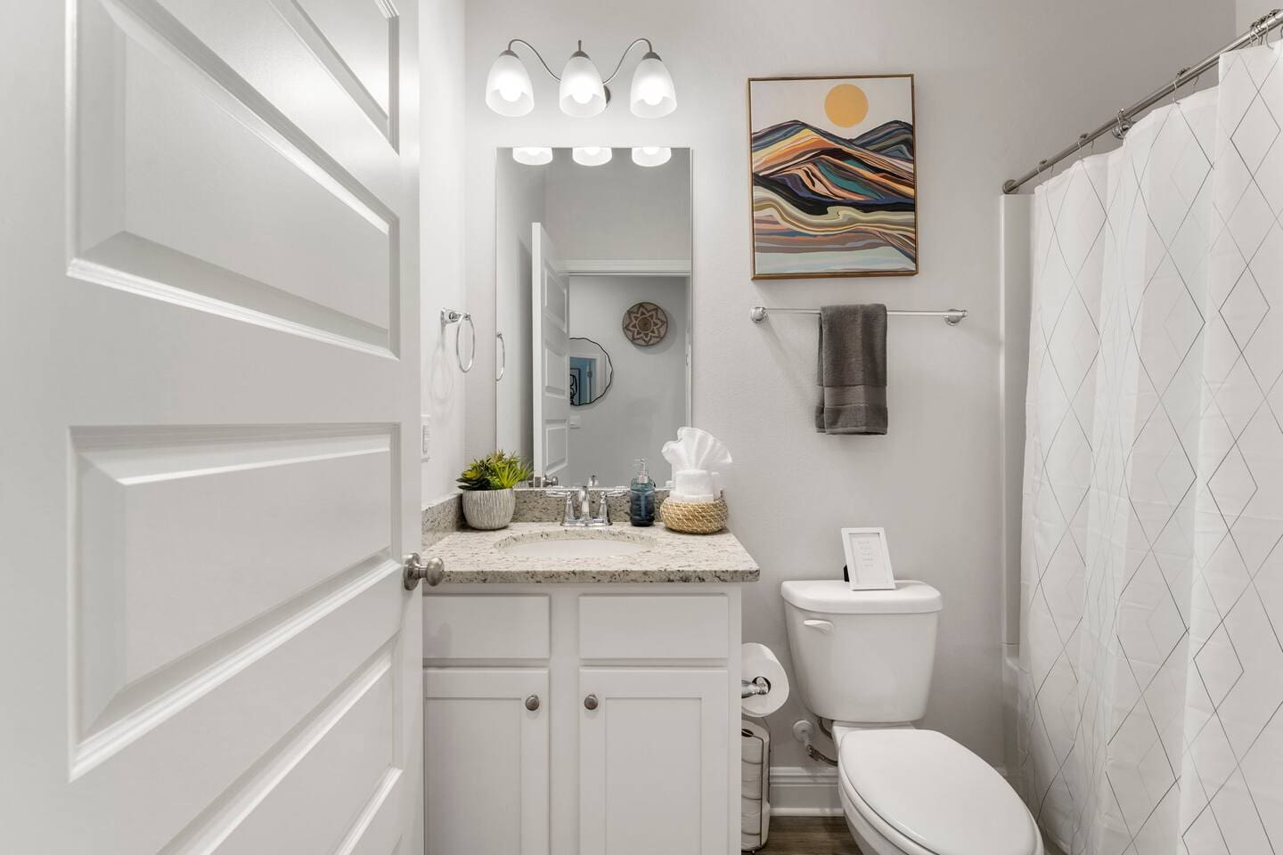Charming cozy bathroom with warm, inviting details.