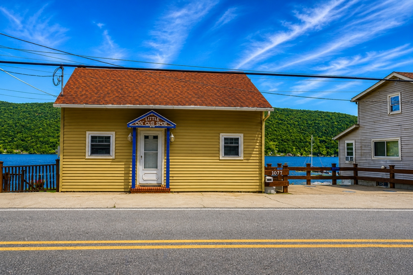 Welcome to a home that offers the best of both worlds. The back of this stunning house features a peaceful, private retreat, while the front boasts a breathtaking view of a serene lake. 