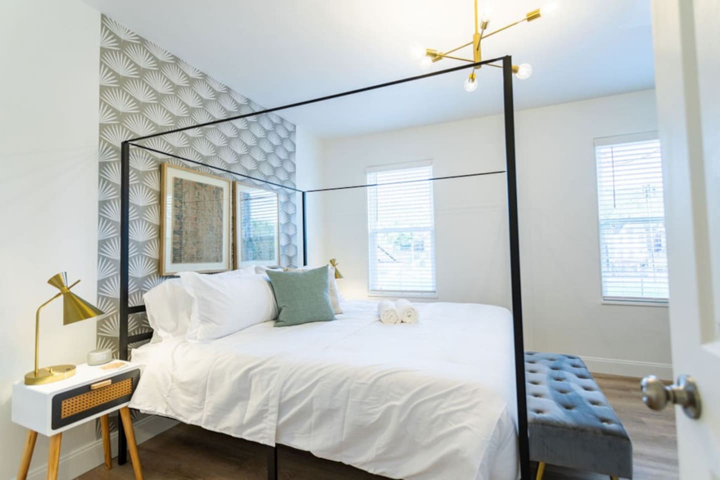 Luxurious king-sized bedroom featuring a unique, eye-catching bed frame for a stylish and comfortable stay.