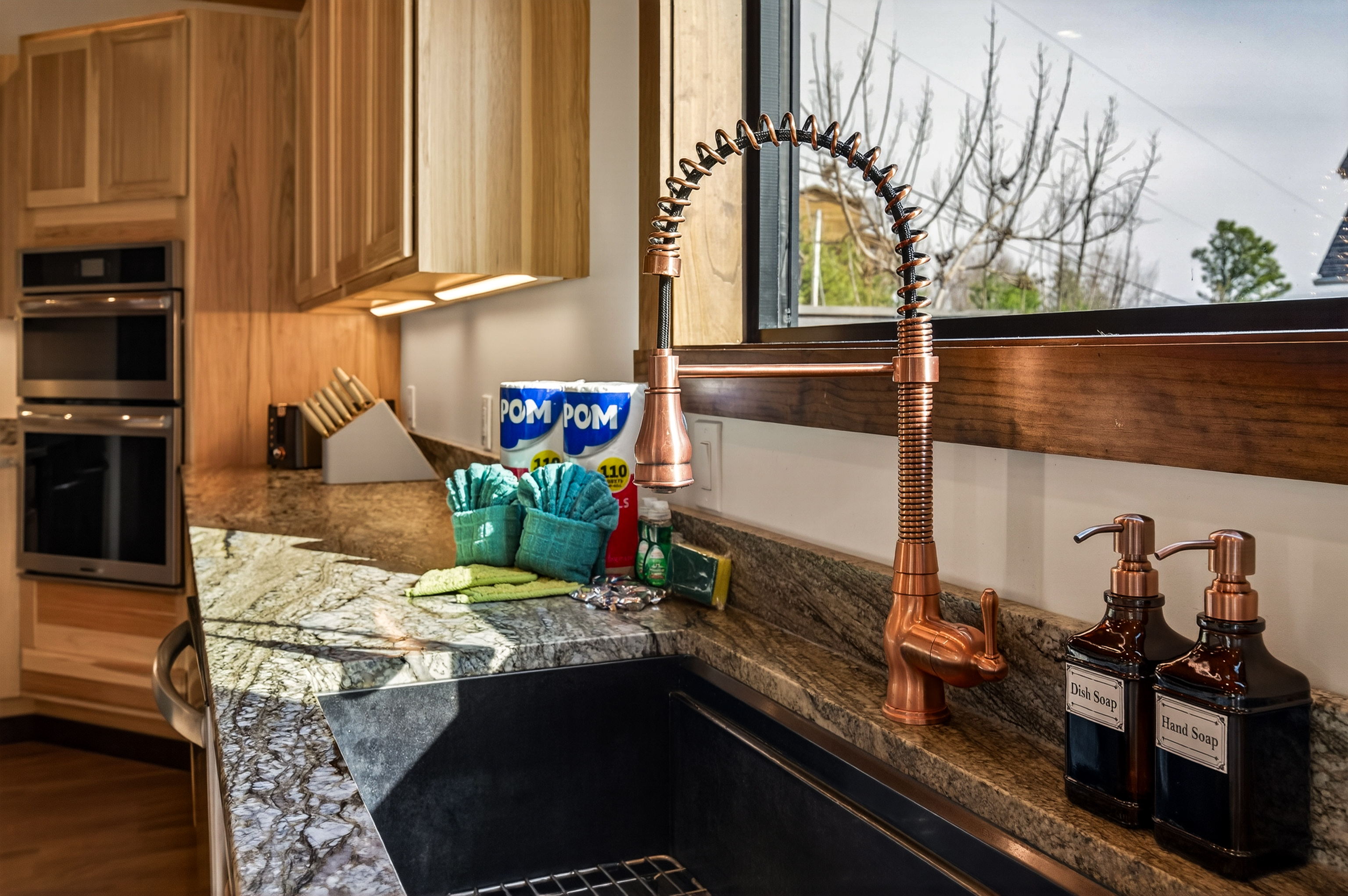 🍽️ Chef’s Kitchen– This fully stocked kitchen is designed for gathering & entertaining, featuring 2 full-size refrigerators, 4 ovens, 2 dishwashers, 2 microwaves & 2 sinks, plus a coffee bar. Perfect for preparing meals for the whole group.