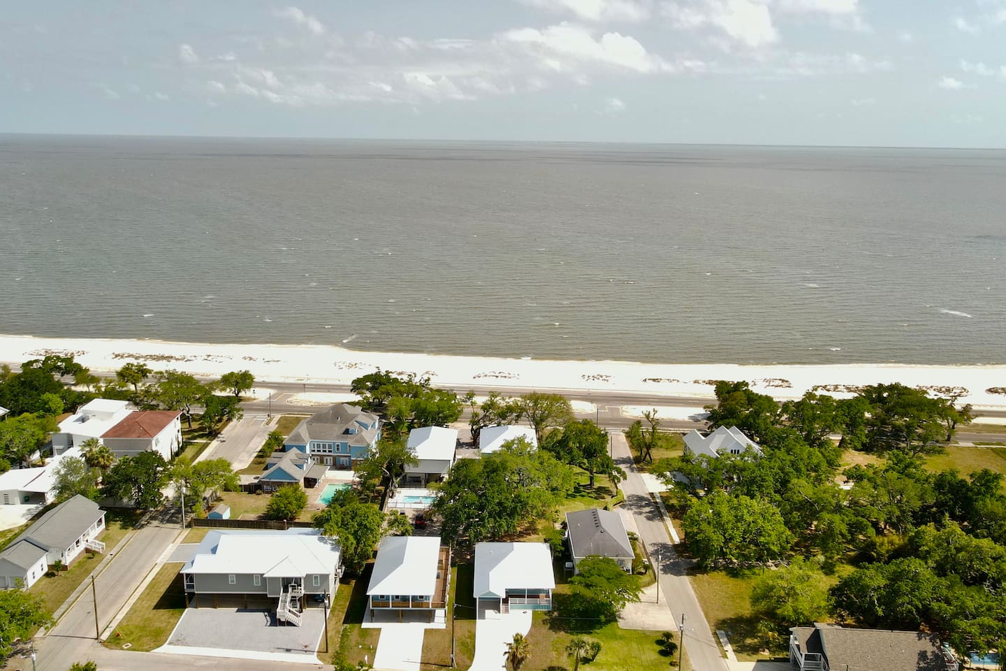 Stay steps from the beach and wake up to endless ocean views.