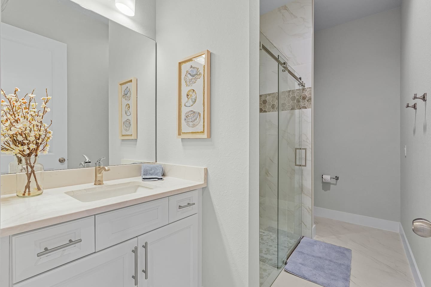 Convenient 3rd guest bathroom with a modern vanity and refreshing shower for your comfort!