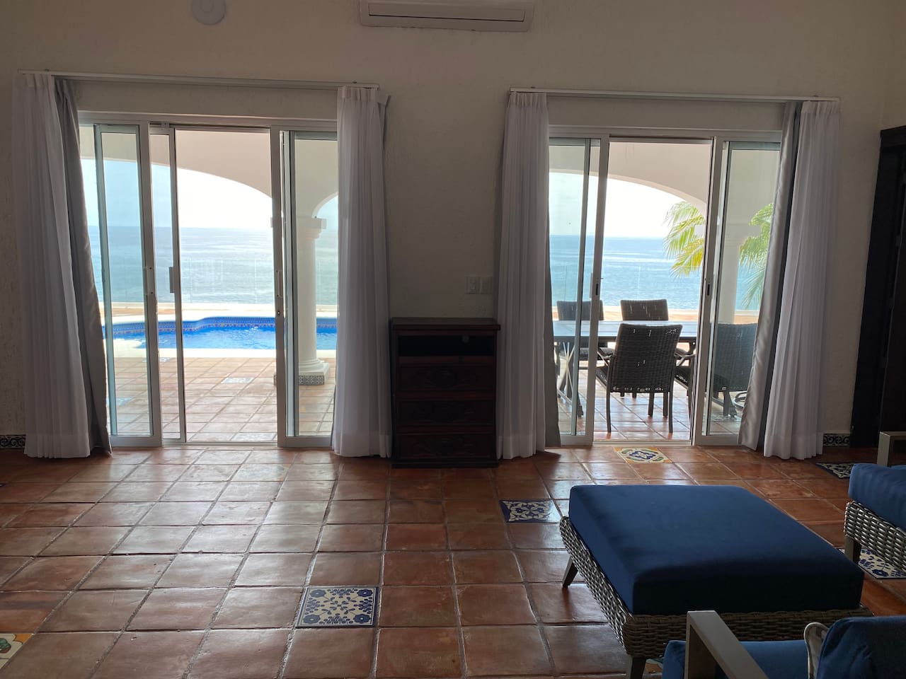 Views of the pool and ocean from living room 
