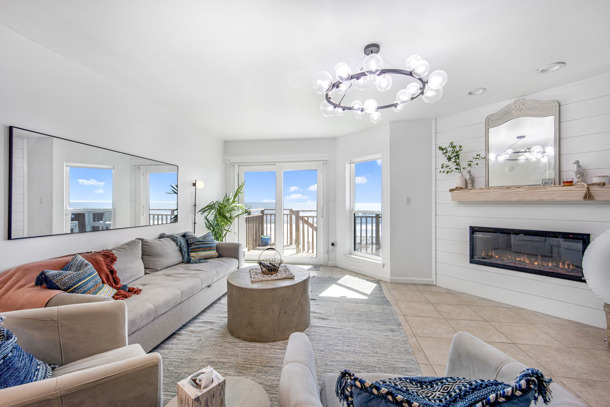 *Living room with Queen Sofa Sleeper and Frame TV* This living room with a Gulf view is more than just a room; it's a sanctuary where you can escape the hustle and bustle of daily life