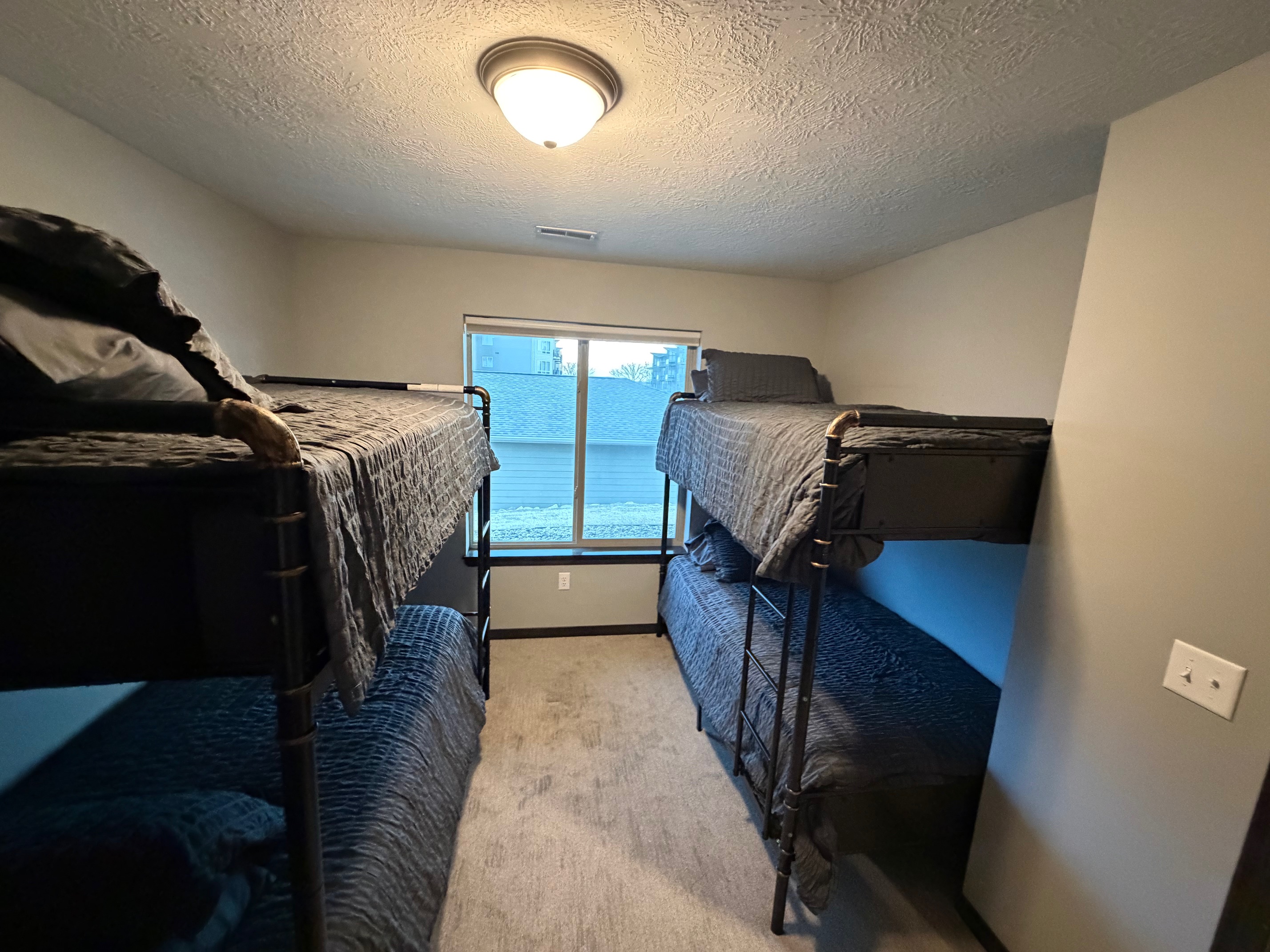 2 sets of twin/twin bunk beds in downstairs guest room