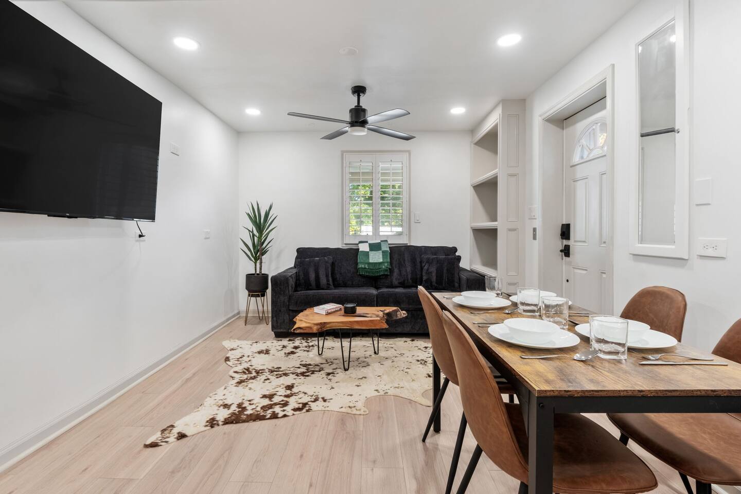 Living room includes Smart TV and easy access out. 