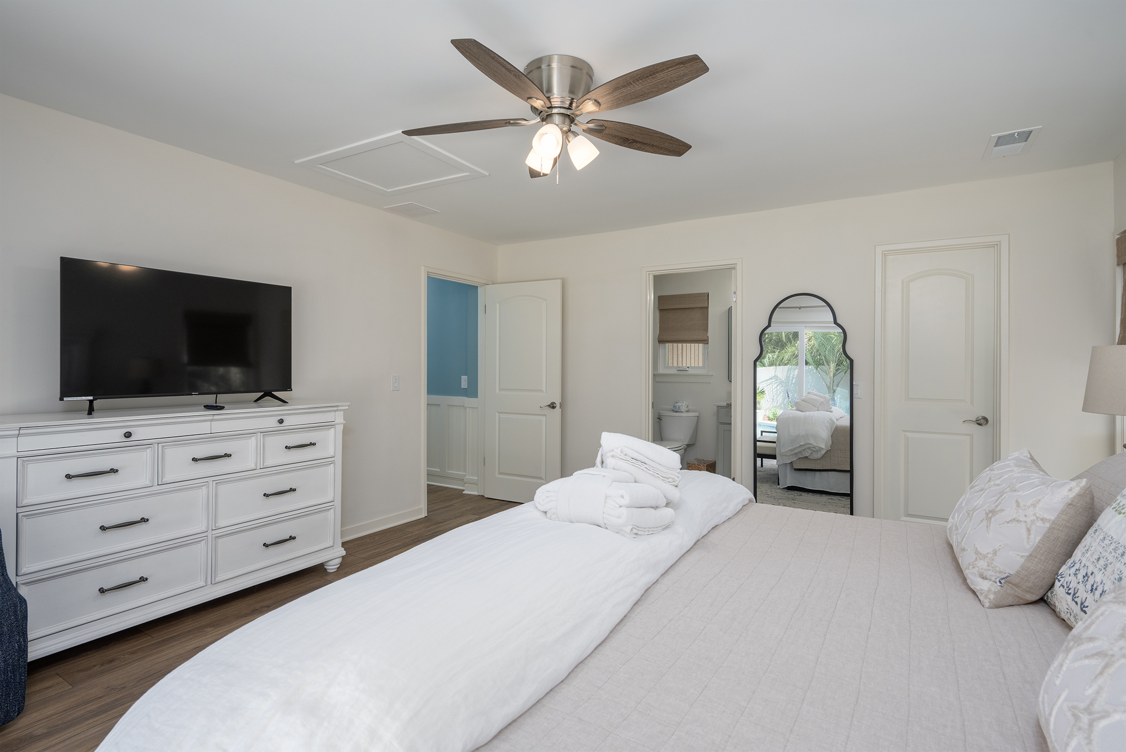 Primary bedroom has private bathroom and features a 55" LED HDTV
