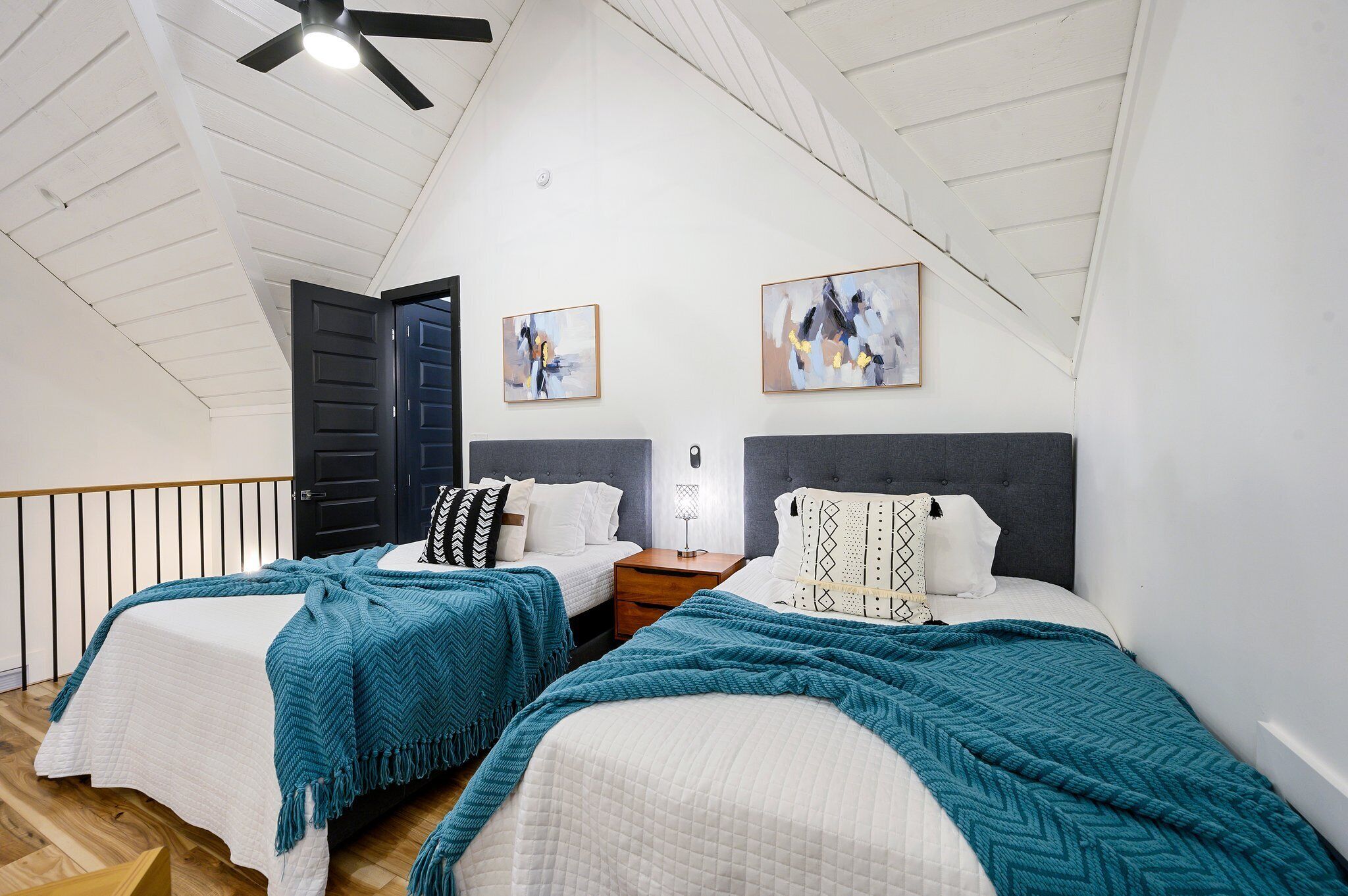 Game room by day, cozy sleeping space by night