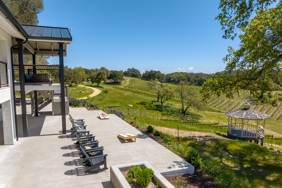 Relax on the spacious terrace with sweeping vineyard and countryside views.